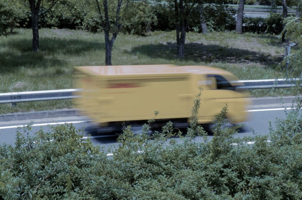 DHL truck blurred